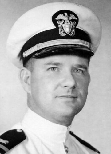 Floyd E. “Gene” Combs